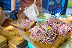 Fresh meat plate at a foodtruck festival ready to be served photo