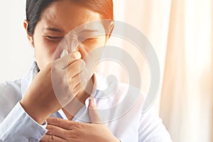 A foul smell when breathing may be caused
