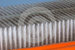 fouled filter cartridge with fibrous lint element to be replaced to restore engine performance photo