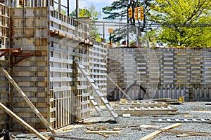 The foundation building ground with metal holders formwork under construction