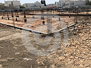 Foundation construction works includes sand filling pedestal concrete beam reinforcement and consolidation works for an house