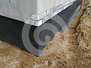 Foundation drainage preparation in construction site