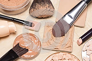 Foundation makeup products on crumpled paper