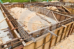 Foundation, pillar and beam being constructed at construction site