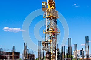 The foundation on reinforced concrete piles and the frame during the construction of a multi-storey building