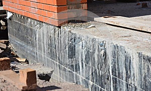 Foundation Waterproofing and Dampproofing Coatings. Waterproofing house foundation.