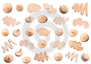 Foundations of various shades and textures for different skin tones and types isolated on white. Set of samples