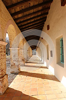 The long collonade at the Mission San Antonio de Padua, Jolon CA. photo