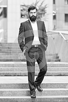 Founder successful business. Conquer business world. Bearded man going to work. Business man in modern city. Beginning