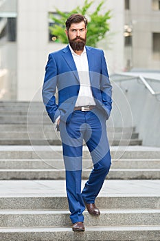 Founder successful business. Conquer business world. Bearded man going to work. Business man in modern city. Beginning