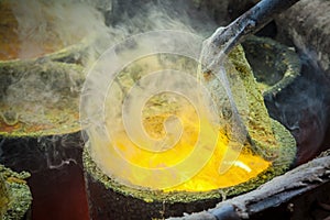 Foundry - molten metal poured from ladle