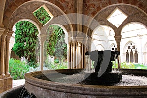 Fountain for ablutions and the courtyard of the ancient monastery of Poblet cat. Reial Monestir de