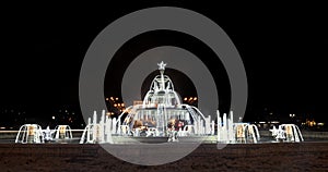 Fountain `Alexandru Ioan Cuza` lighted and ornaments in front of The House of People