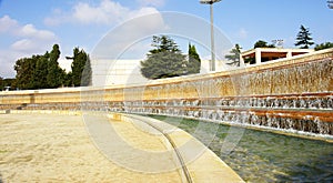 Fountain with artificial waterfall in the Olympic ring of Barcelona