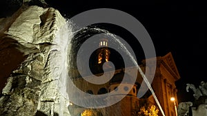 Fountain in Asiago Italy at night