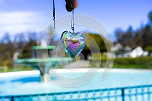 Fountain backgroundheart crystal glass refract sunlight - fountain background