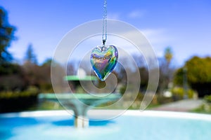 Fountain backgroundheart crystal glass refract sunlight - fountain background