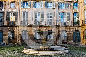 Fountain with Beautiful Old House in the Back at Place D`Albertas in Aix-en-Provence