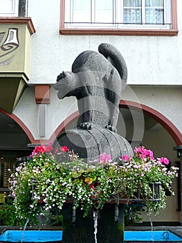 Fountain `Black Cat` in the winegrowing city of Zell on the Moselle River, Germany