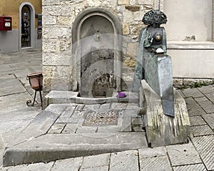 Fountain & bronze sculpture titled Allegory of Renaissance Florence by Alberto Iglesia in Castellina in Chianti, Italy.