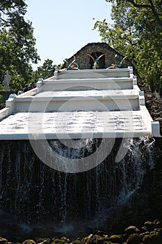 Fountain cascade Chess Mountain on a sunny day. Lower Park, Peterhof