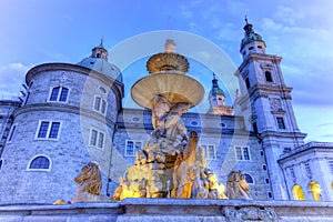 Fountain and cathedral at the Residenzplatz in Salzburg, Austria