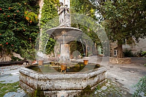 Fountain in centre of Saignon, Provence, France