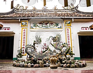 Fountain with chinese dragons in Phuc Kien Assembly Hall, Hoi An, Vietnam