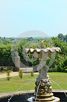 Fountain in classical english garden