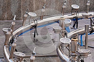 Fountain components with nozzles, lights and electrical connections. High pressure equipment and water purification