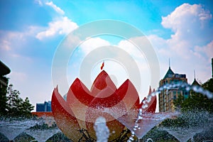 A fountain at the downtown at Nguyen Hue street in Ho Chi Minh long shot