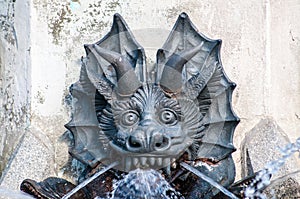 The Fountain of the Fallen Angel in Madrid, Spain photo