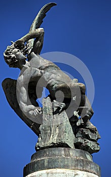 The Fountain of the Fallen Angel (Fuente del Angel Caido) or Monument of the Fallen Angel, a highlight of the Buen Retiro Park in photo