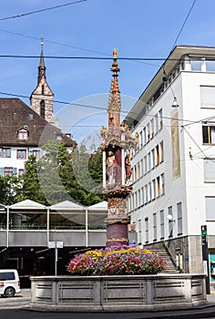 The fountain on the Fish Market Square, Basel photo