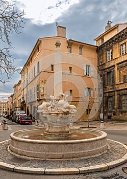 Fountain of four dolphins in Aix en Provence, in France photo