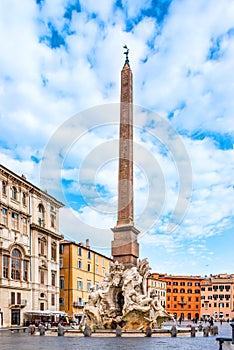 The Fountain of The Four Rivers and the egyptian obelisk at Navona Square, Rome, Italy.