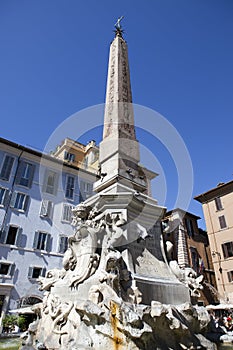 Fountain of the Four Rivers (Fontana dei Quattro Fiumi) with an Egyptian obelisk. Italy. Rome. Navon Square (Piazza Navona).