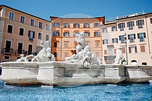 Fountain Four rivers in Piazza Navona, Rome, Italy, Europe, blue sky light sun