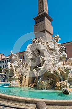 The Fountain of the Four Rivers at the Plaza Navona in Rome, Italy photo