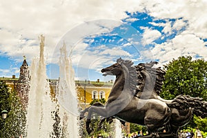 Fountain `Four Seasons`, located on the Manege Square. Statues of four frolicking horses. Moscow city center.