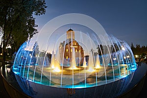 Fountain in front of the church at night