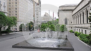 Fountain in front of New York City\'s Metropolitan Museum of Art as seen from the steps at the entrance to the museum