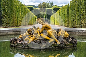 Fountain in the gardens of the Versailles Palace