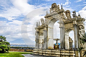 The fountain of giant, also known as Immacolatella fountain , at Via Partenope, in Naples , Italy photo