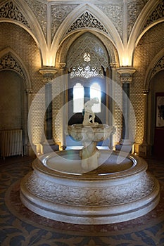 Fountain in gothic revival interiors in Monserrate palace, Sintra, Portugal