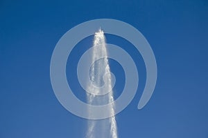 The fountain jet against the background of the sky