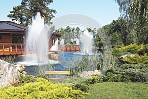 Fountain on the lake in the landscape park Mezhigirya near Kiev, Ukraine.