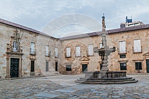 Fountain at Largo do Paco square in Braga with the Rectorate of the university of Minho, Portug