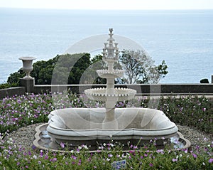 A fountain in Mauritanian style, in a garden on a seashore