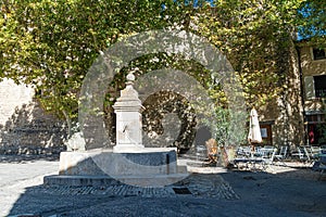 Fountain in medieval village of Gordes , Provence